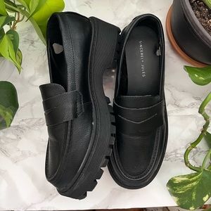 Black platform loafers